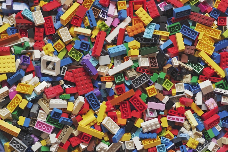 Colorful building blocks set arranged in a tower